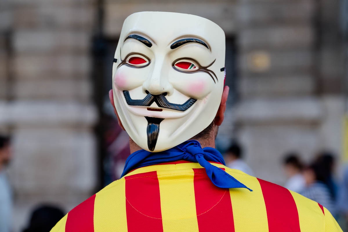 Imatge d'arxiu d'una de les màscares d'Anonymous en una manifestació
