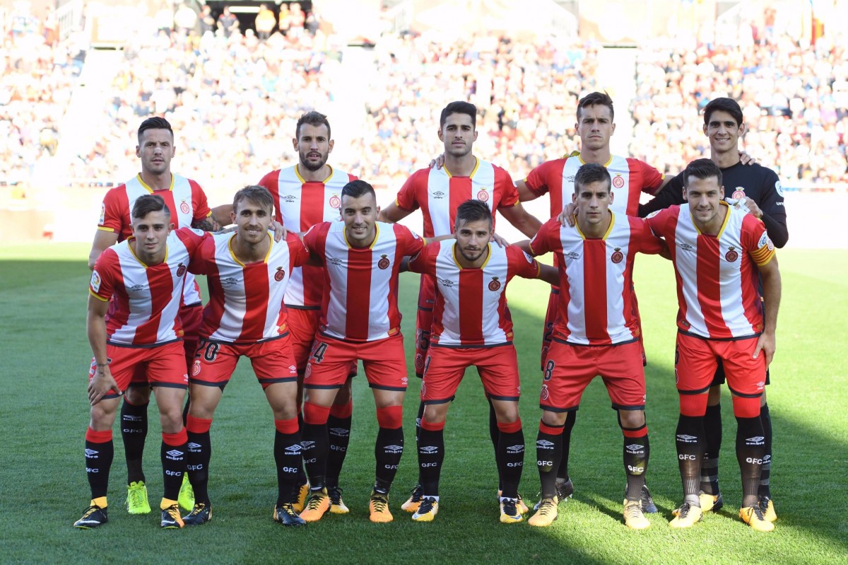 Els jugadors del Girona, abans de començar el partit