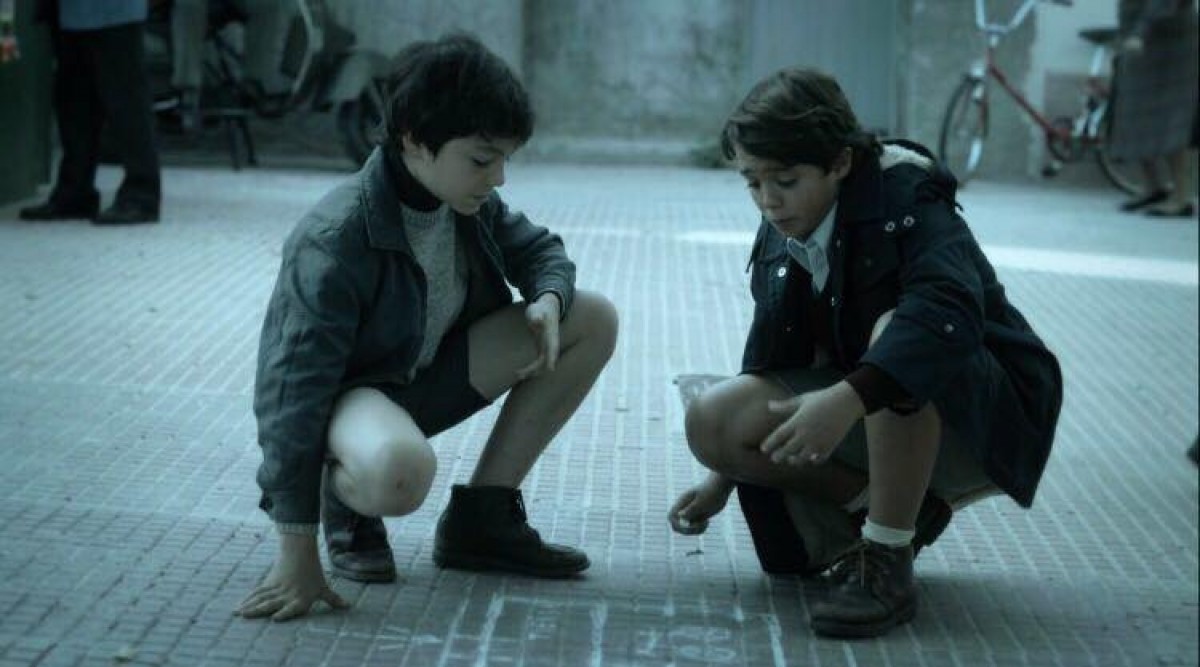 Ivan Luengo, a la dreta, interpreta el paper de Miguel un nen de deu anys