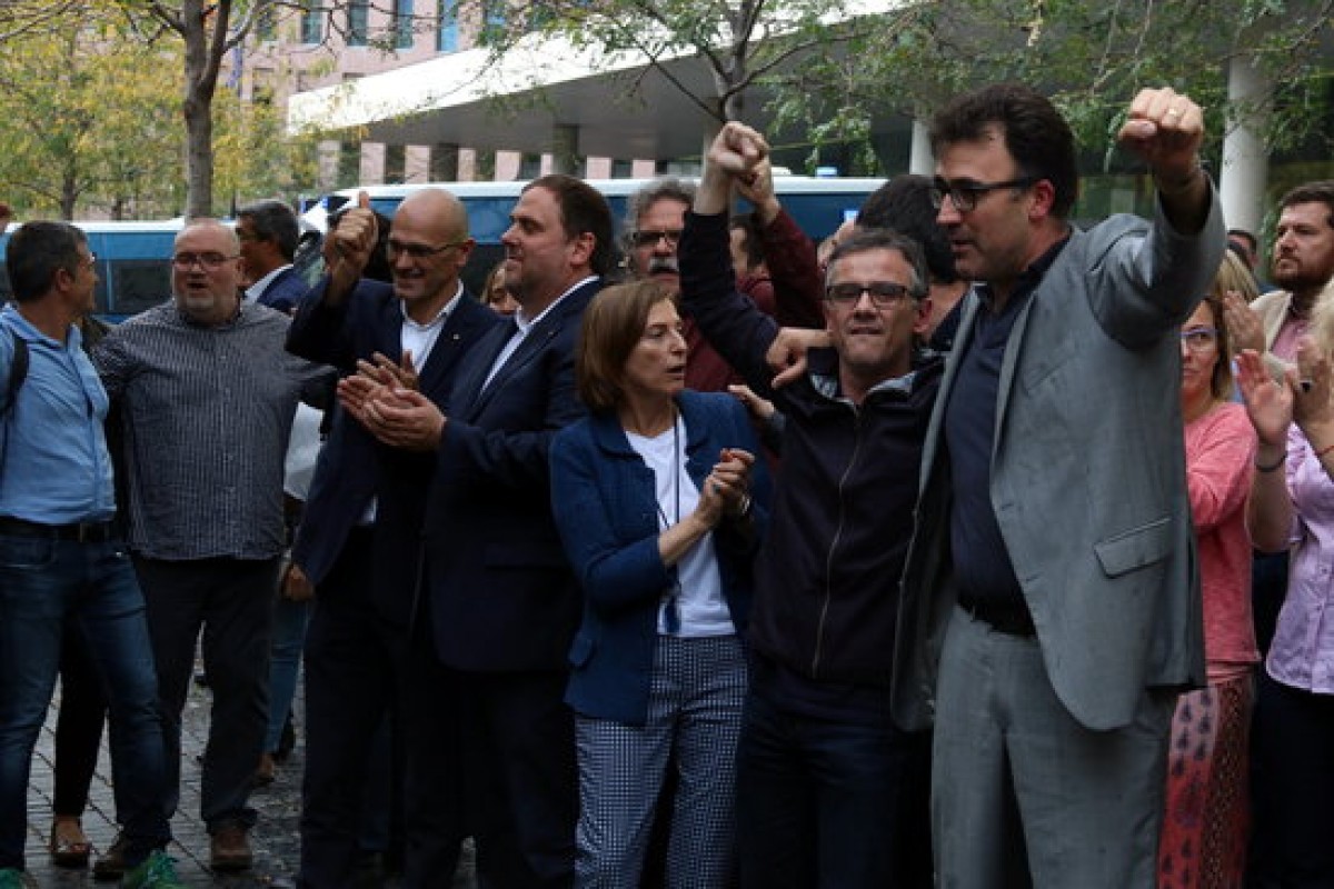 Josep Maria Jové i Lluís Salvadó, a la sortida del TSJC, després de ser detinguts, el 2017
