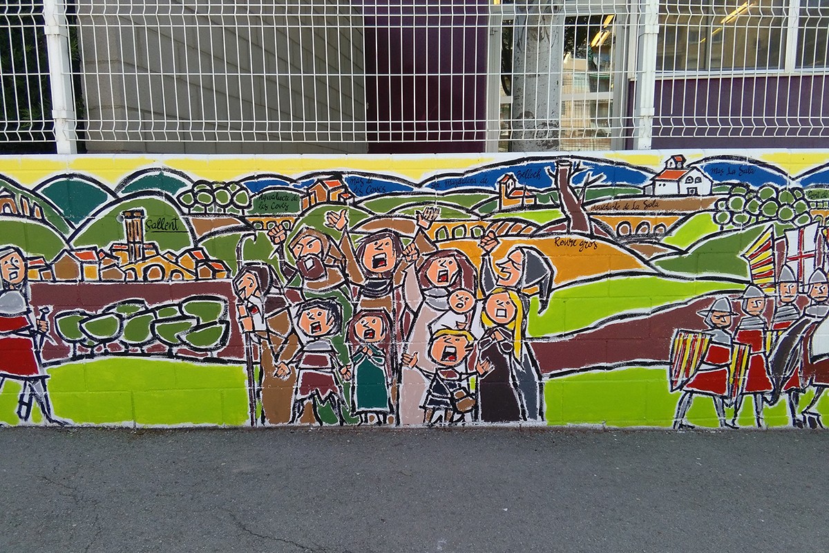 Vista parcial del mural a l'exterior de l'escola la Sèquia dissenyat per Jaume Gubianas
