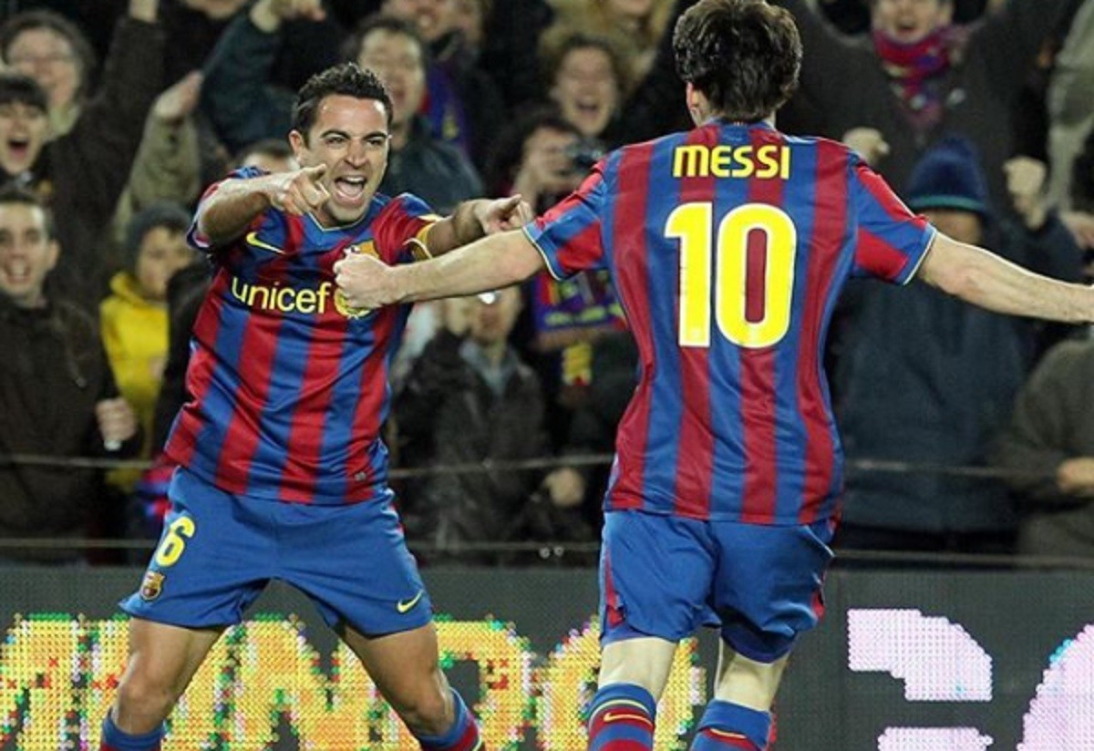 Xavi i Messi celebren un gol amb el Barça.