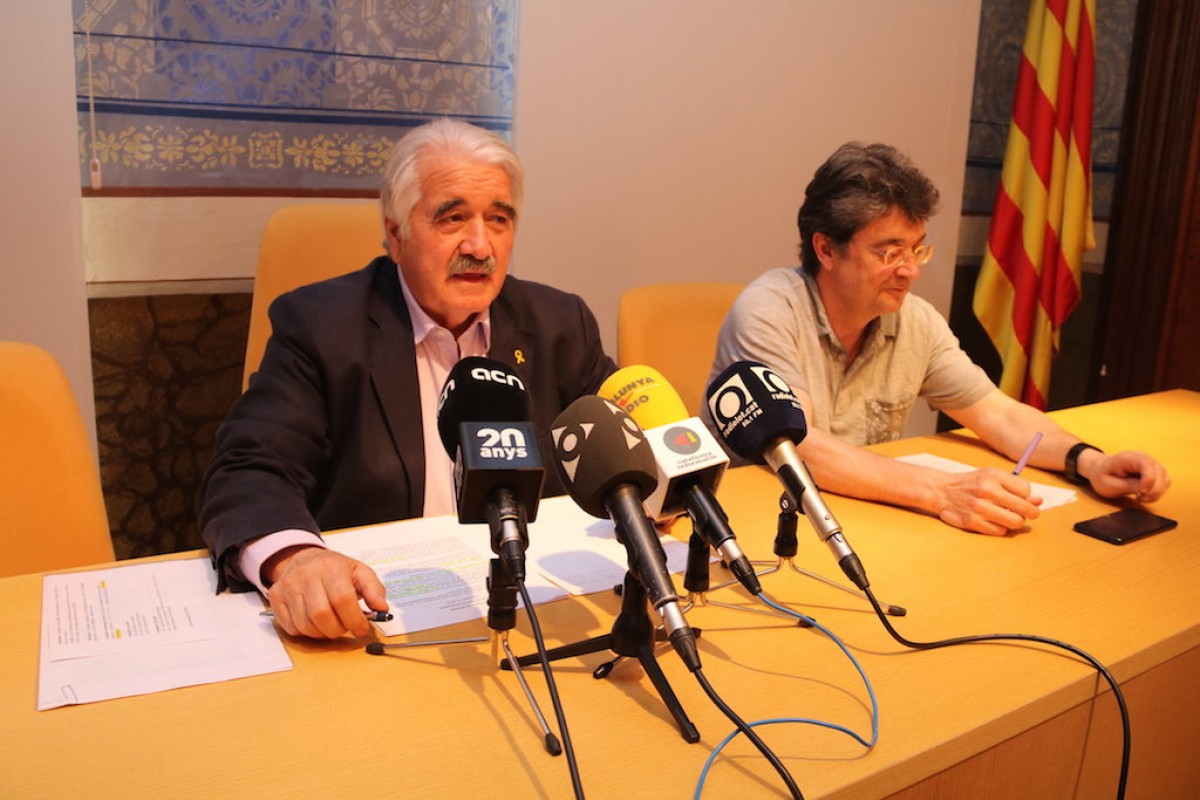 Joan Espona, president del Consell Comarcal de la Garrotxa i Francesc Canalies,  director del SIGMA