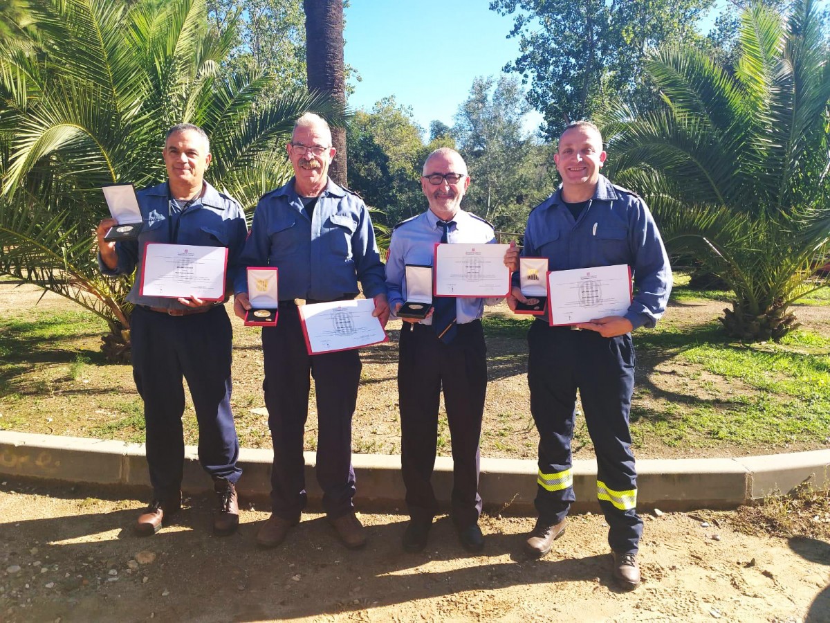 Els quatre bombers voluntaris d'Arbúcies que han rebut un reconeixement