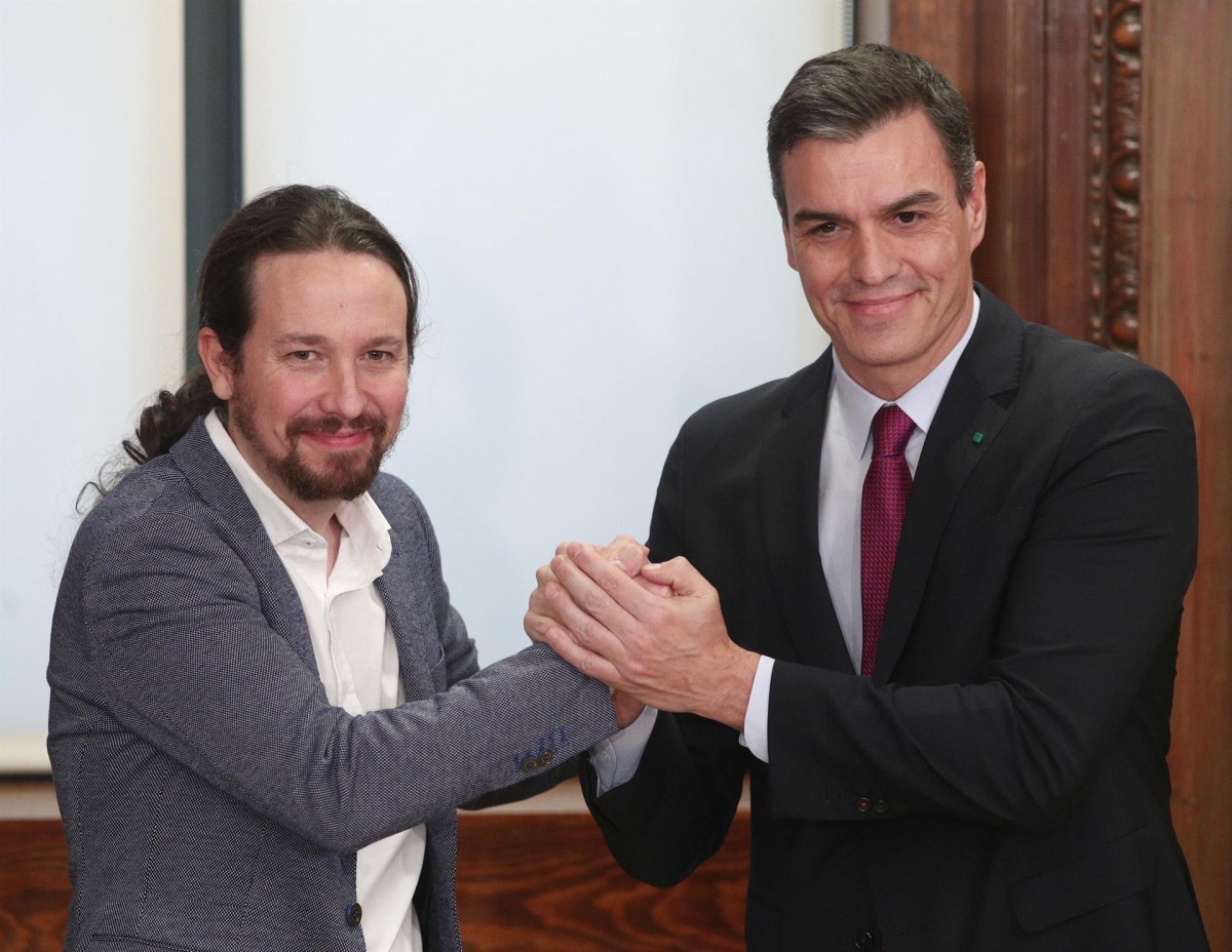Pedro Sánchez i Pablo Iglesias, durant l'anunci del preacord de govern del 2019