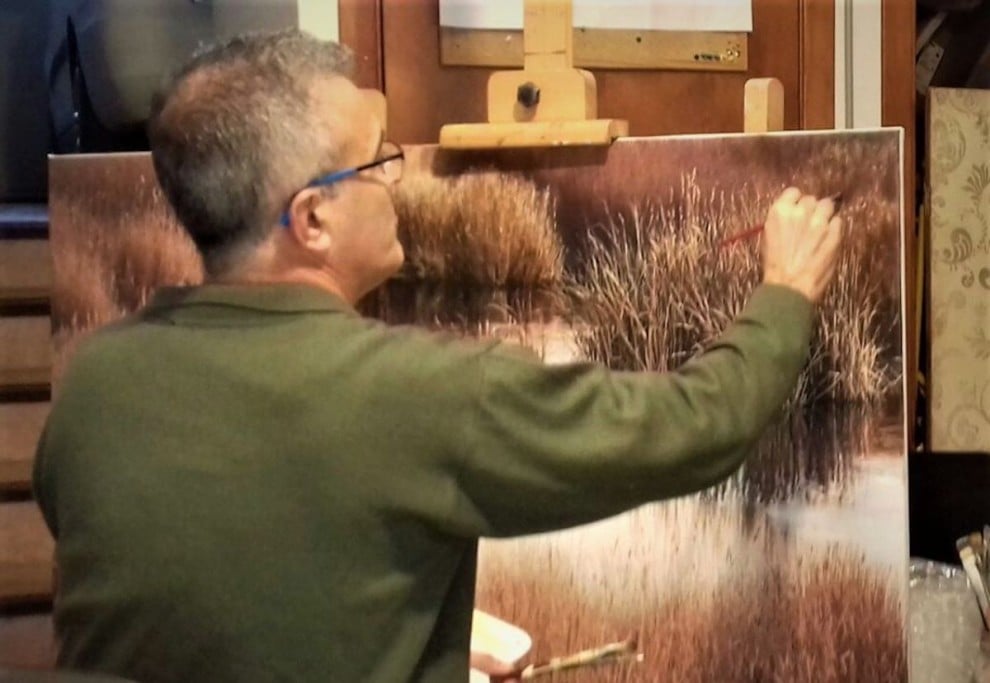 Seguer, pintant una de les seves obres