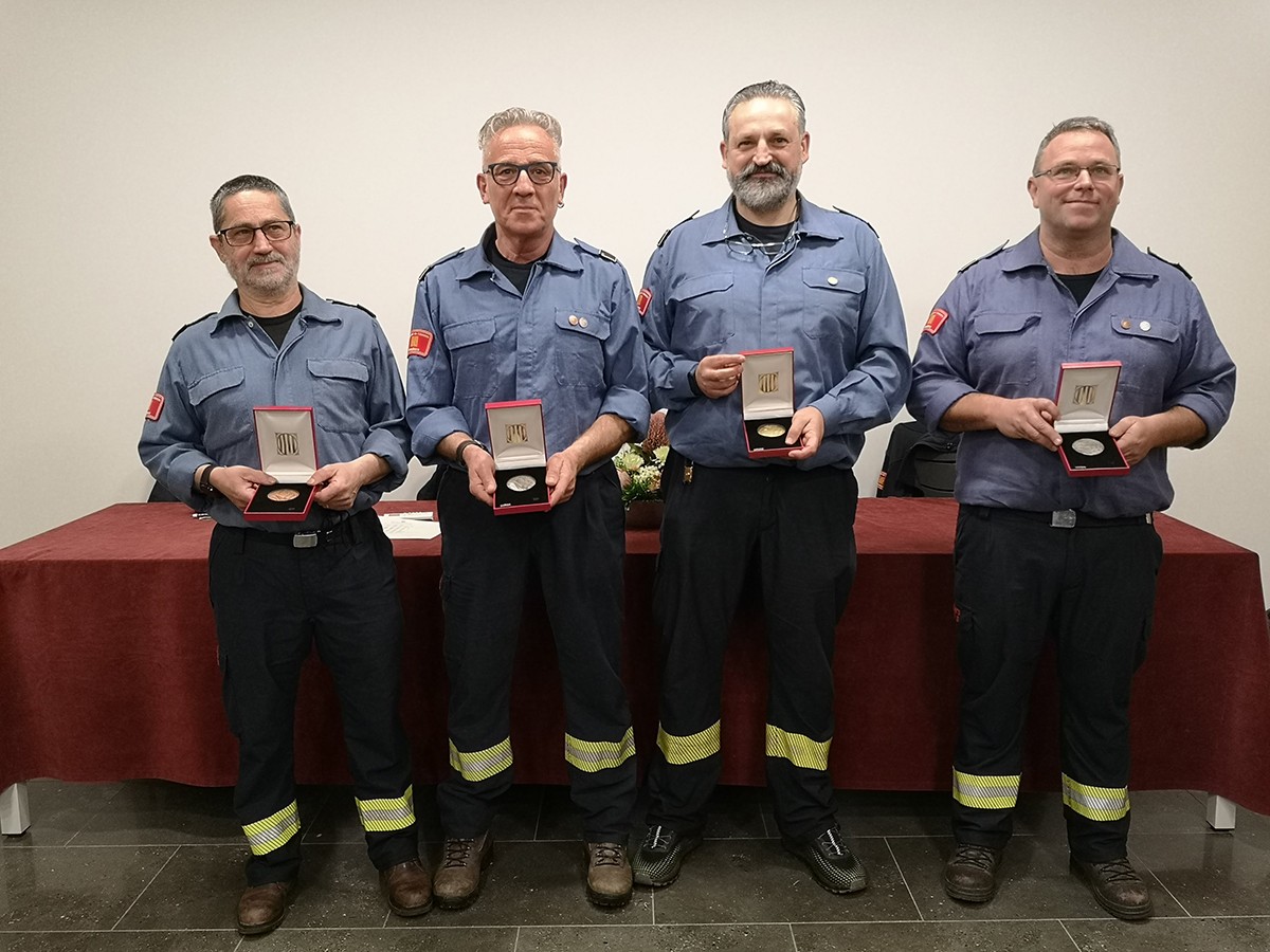Els quatre bombers voluntaris d'Arbúcies homenatjats