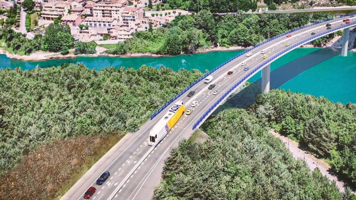 Imatge renderitzada del futur viaducte de Cercs i la màquina del carril reversible operant